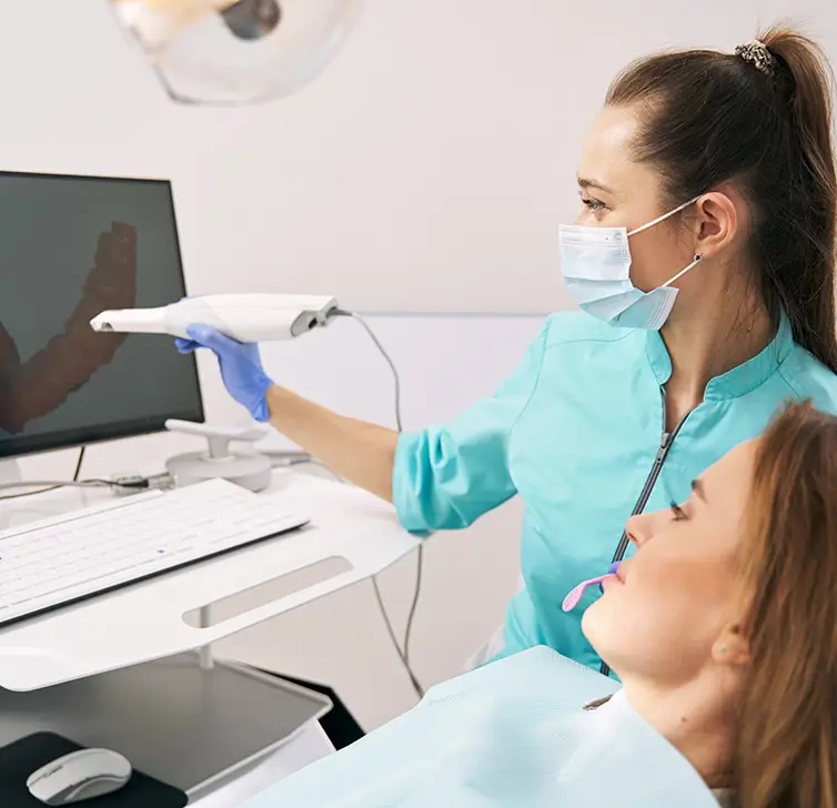 Team member using digital orthodontic technology at Marcel Method